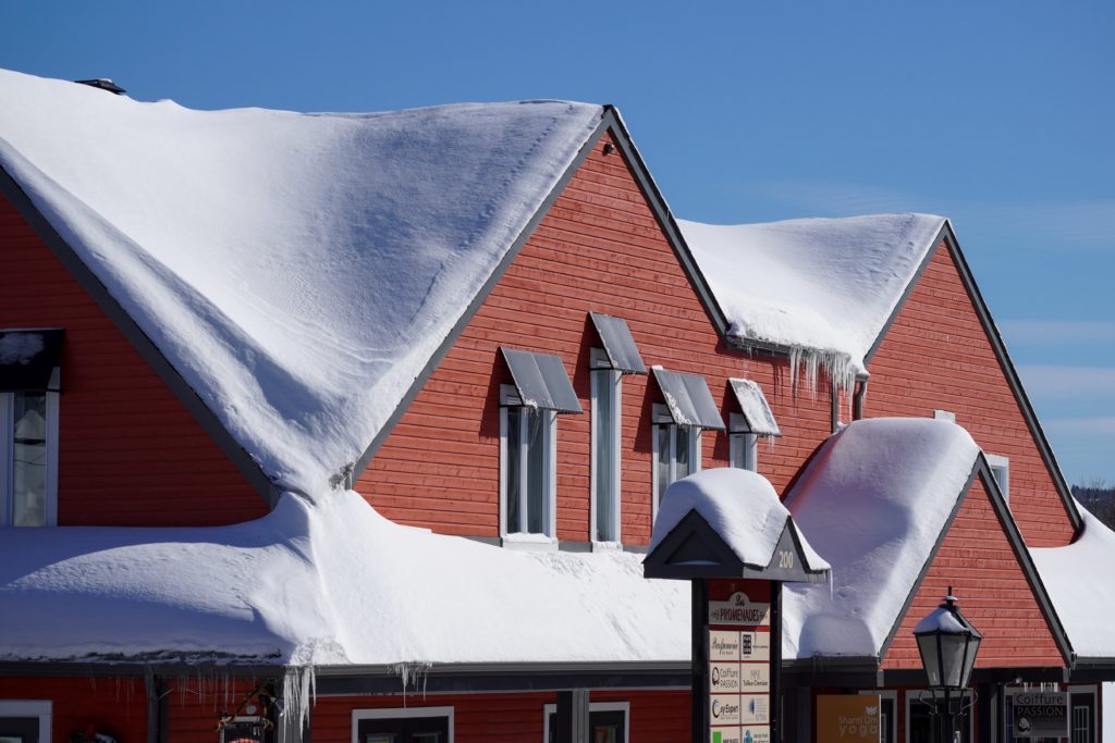 Red Leaf Roofing during Snow